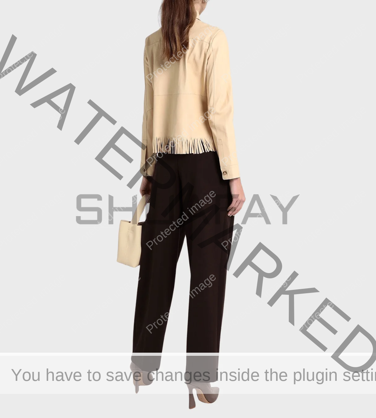 Shuafay leather fringe jacket, stylish beige leather top with fringe detail, luxury biker gear fashion, premium women’s leather jacket for a chic lifestyle, high-quality craftsmanship.